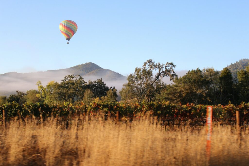 romantic getaway hot air balloon on under blue sky during daytime in napa valley